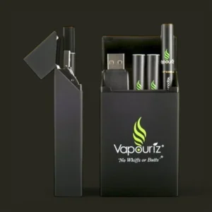 Sleek black Vapouriz e-cigarette packaging with a flip-top lid, featuring a compact storage design for vape pens, cartridges, and a USB charger, set against a dark background.
